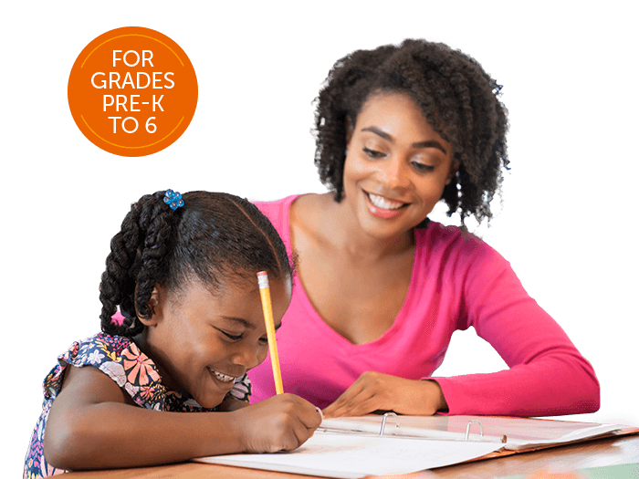 Image of parent helping a child with a worksheet